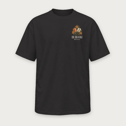 In Bloom pickleball tee by Courtelane in black, front with botanical floral chest print