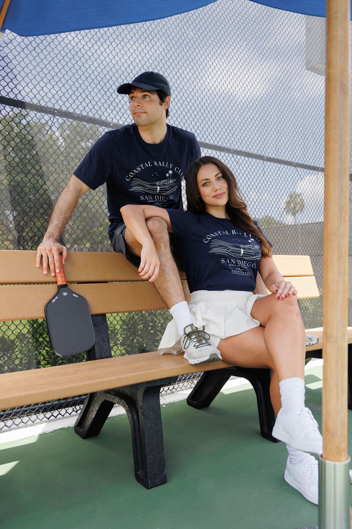 Courtelane players on court wearing City Series tees