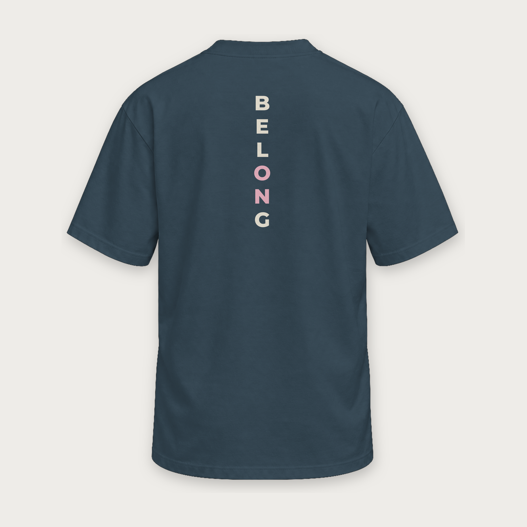 Belong pickleball tee by Courtelane in slate navy, back view with vertical Belong print down the spine