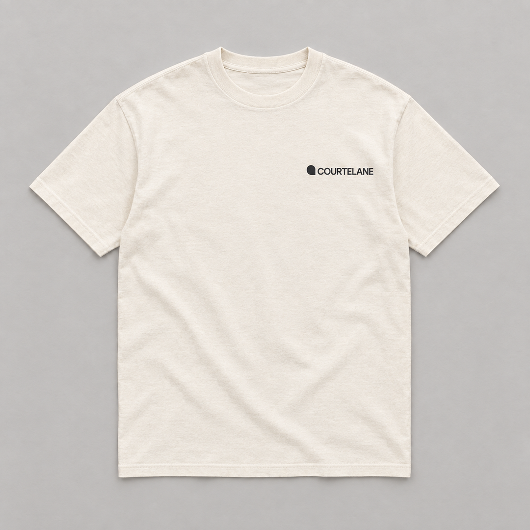 Keep Your Eyes Sharp pickleball tee by Courtelane in cream, front with small Courtelane logo