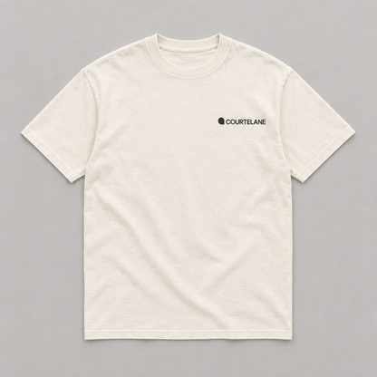 Keep Your Eyes Sharp pickleball tee by Courtelane in cream, front with small Courtelane logo
