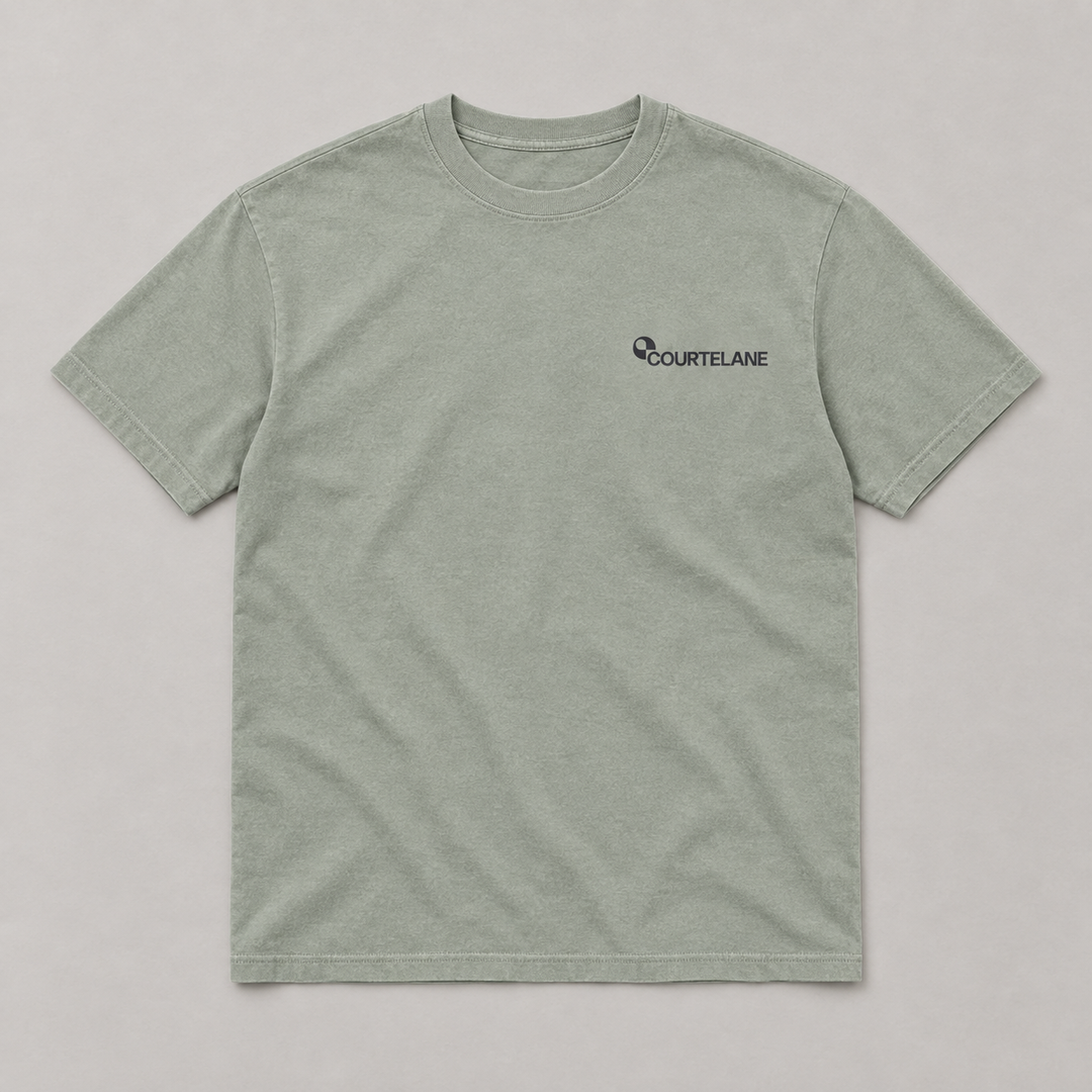 Calm Is a Skill pickleball tee by Courtelane in sage, front with small Courtelane logo